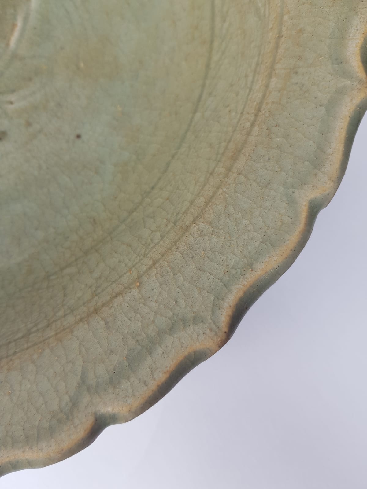 Antique Thai Sawankhalok Celadon Foliate Rim Dish (14th–16th Century)