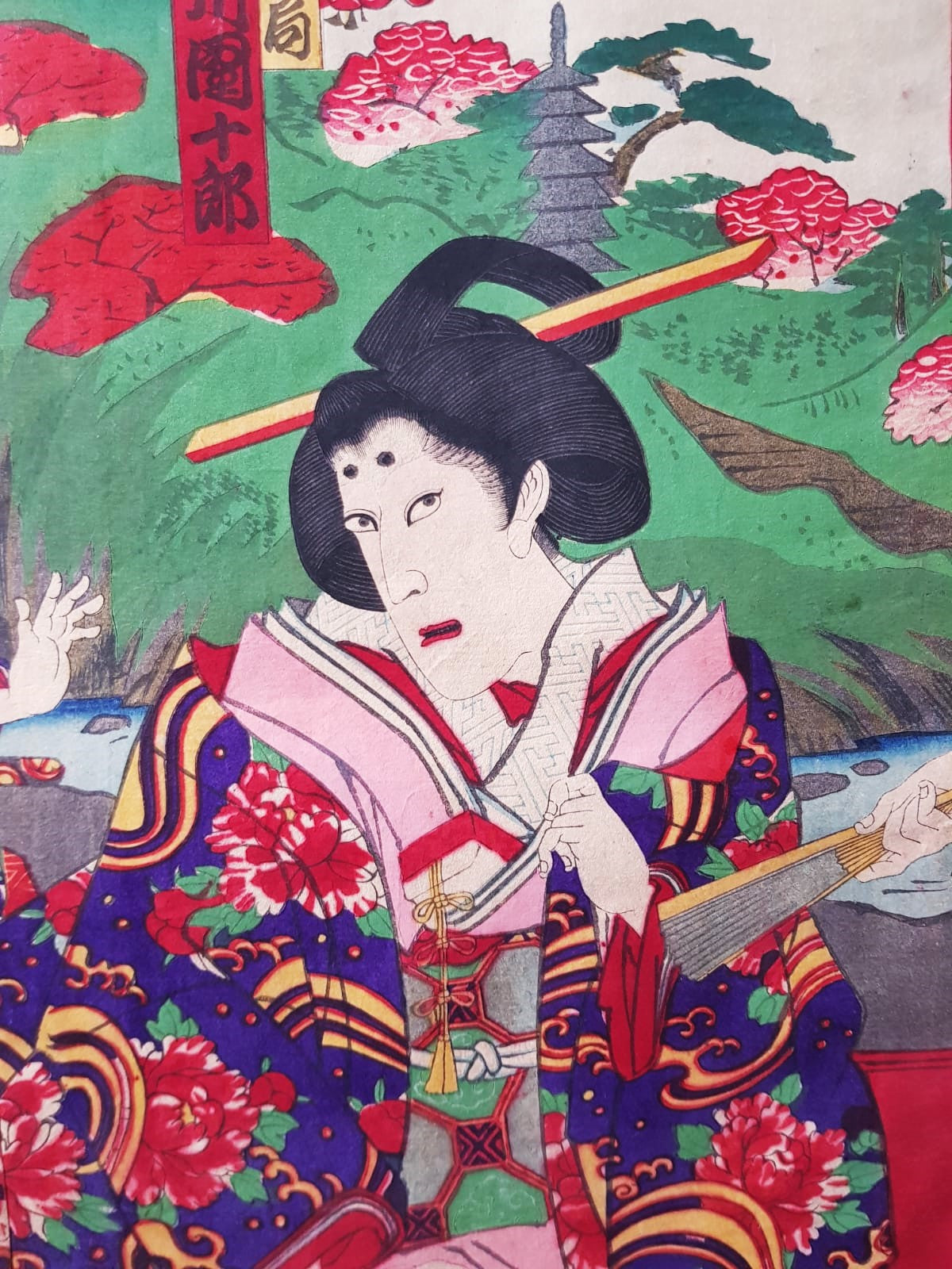 TOYOHARA KUNICHIKA (1835–1900) A Monumental Kabuki Ukiyo-e Triptych: A Scene of Dramatic Conflict beneath the blossoming trees, Japan, Meiji Period