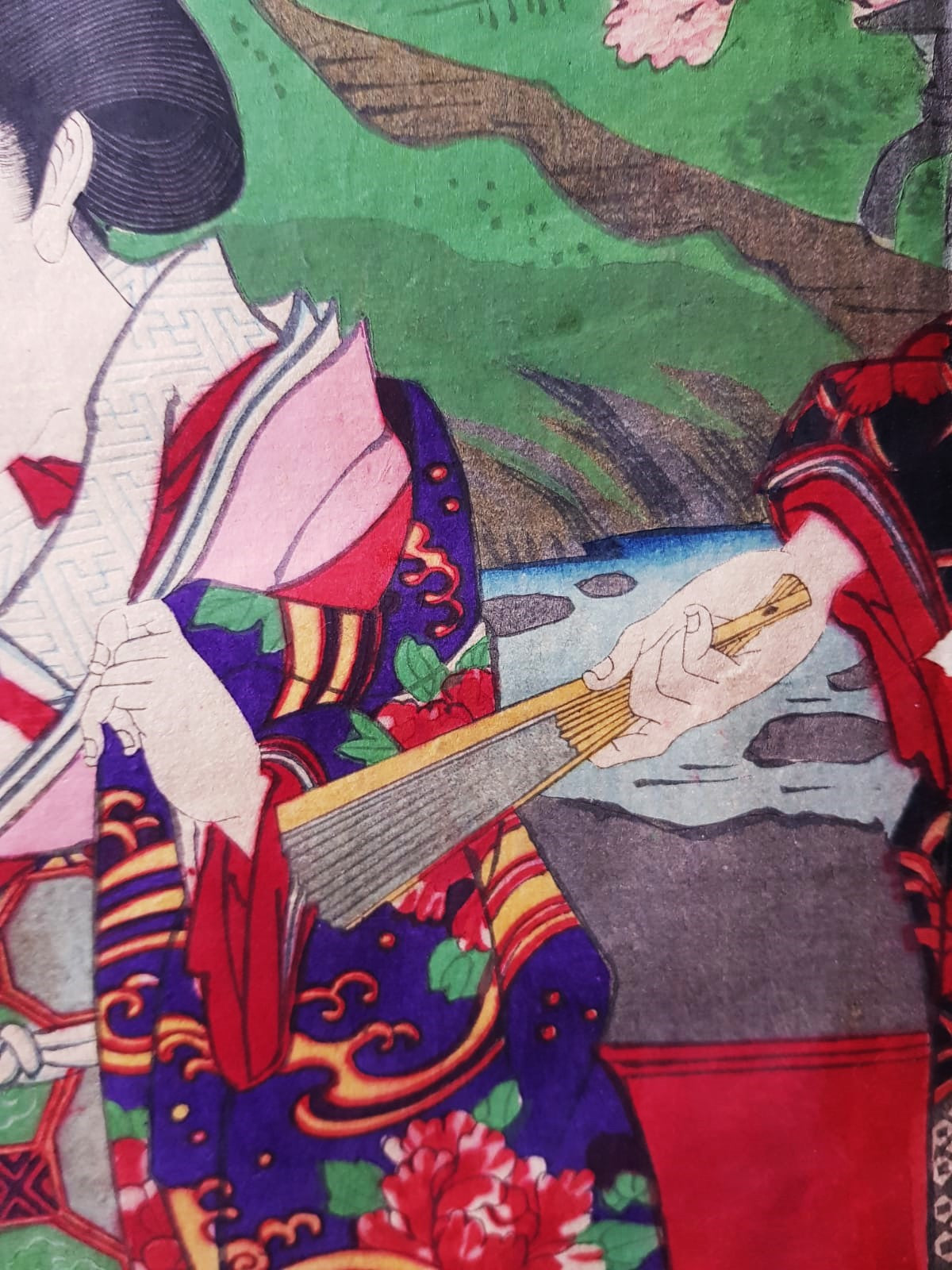 TOYOHARA KUNICHIKA (1835–1900) A Monumental Kabuki Ukiyo-e Triptych: A Scene of Dramatic Conflict beneath the blossoming trees, Japan, Meiji Period