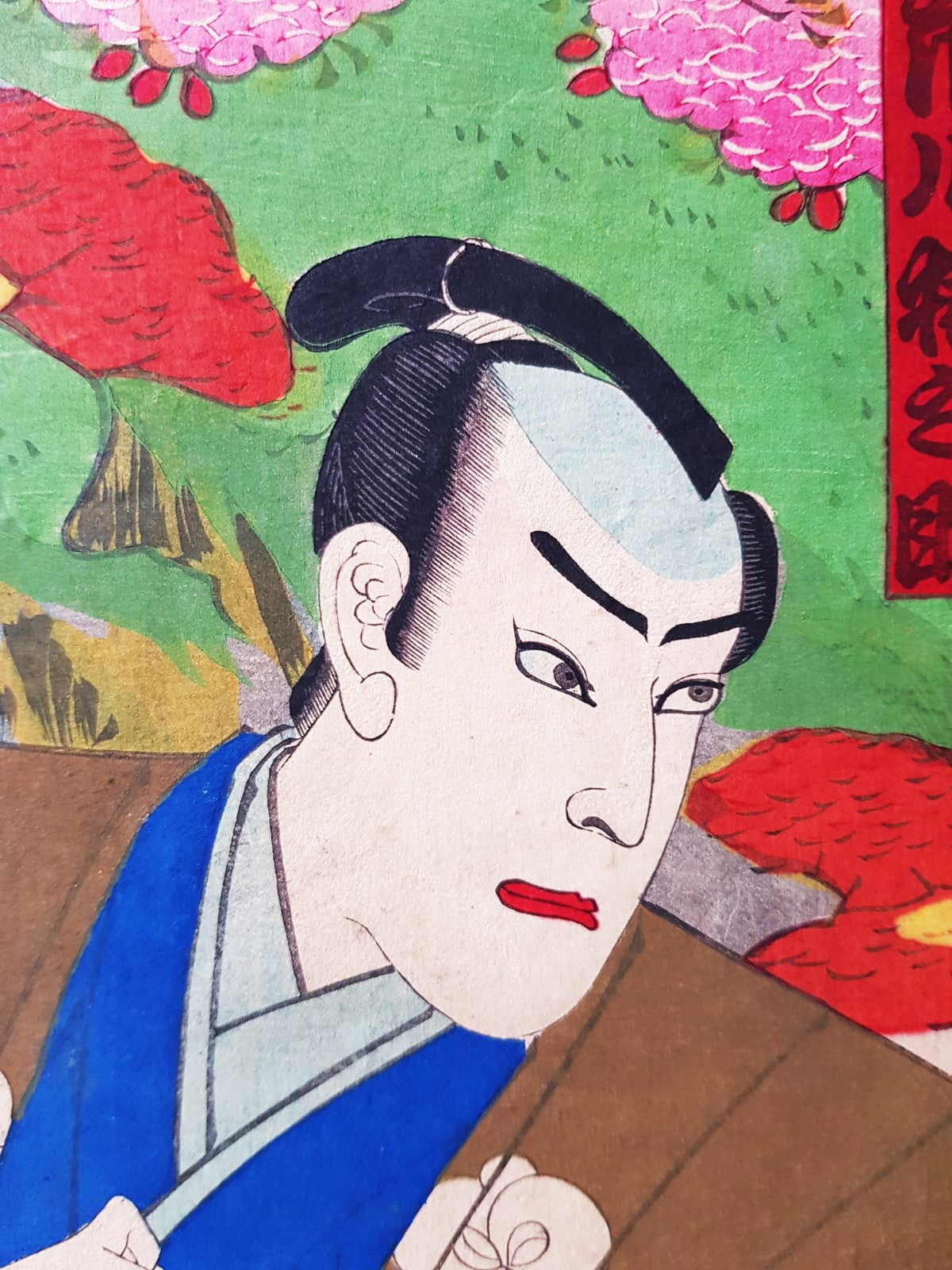 TOYOHARA KUNICHIKA (1835–1900) A Monumental Kabuki Ukiyo-e Triptych: A Scene of Dramatic Conflict beneath the blossoming trees, Japan, Meiji Period