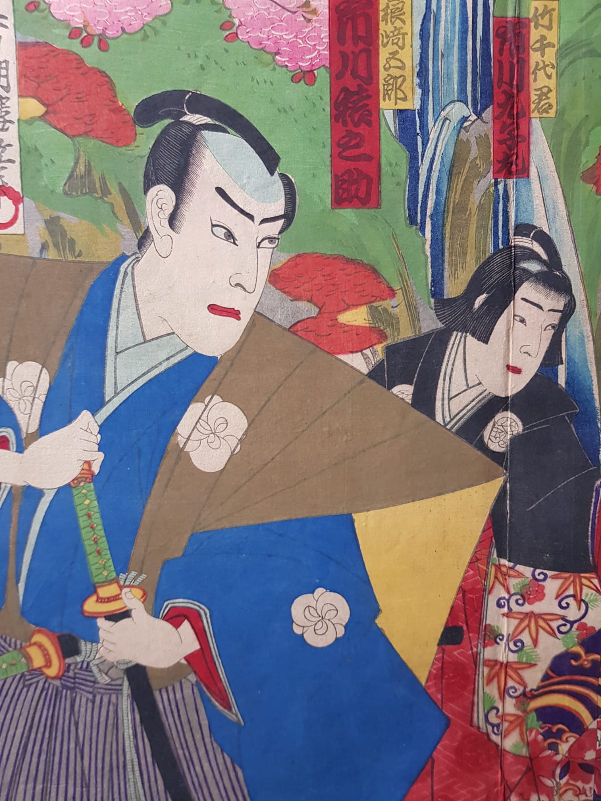 TOYOHARA KUNICHIKA (1835–1900) A Monumental Kabuki Ukiyo-e Triptych: A Scene of Dramatic Conflict beneath the blossoming trees, Japan, Meiji Period