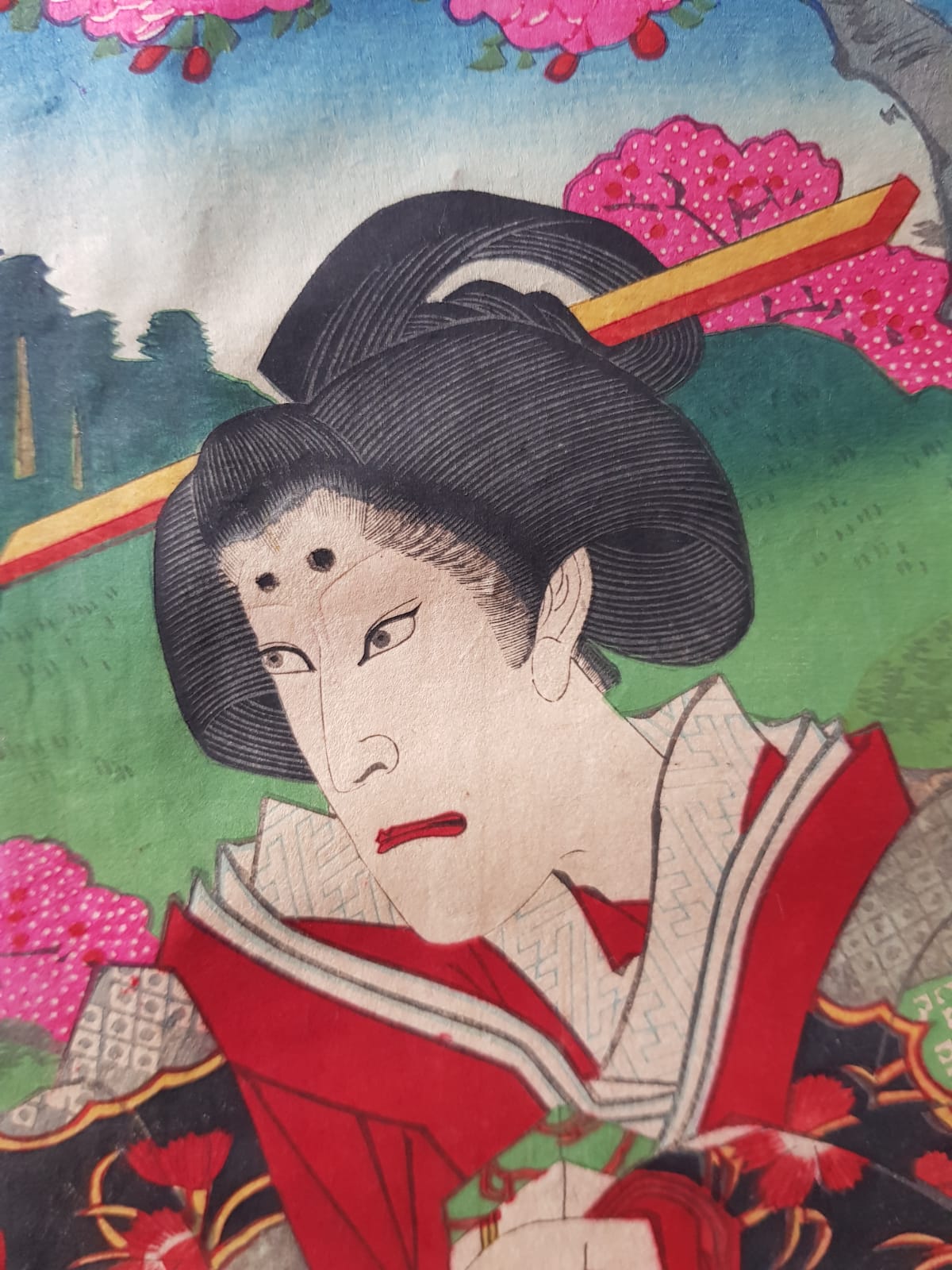 TOYOHARA KUNICHIKA (1835–1900) A Monumental Kabuki Ukiyo-e Triptych: A Scene of Dramatic Conflict beneath the blossoming trees, Japan, Meiji Period