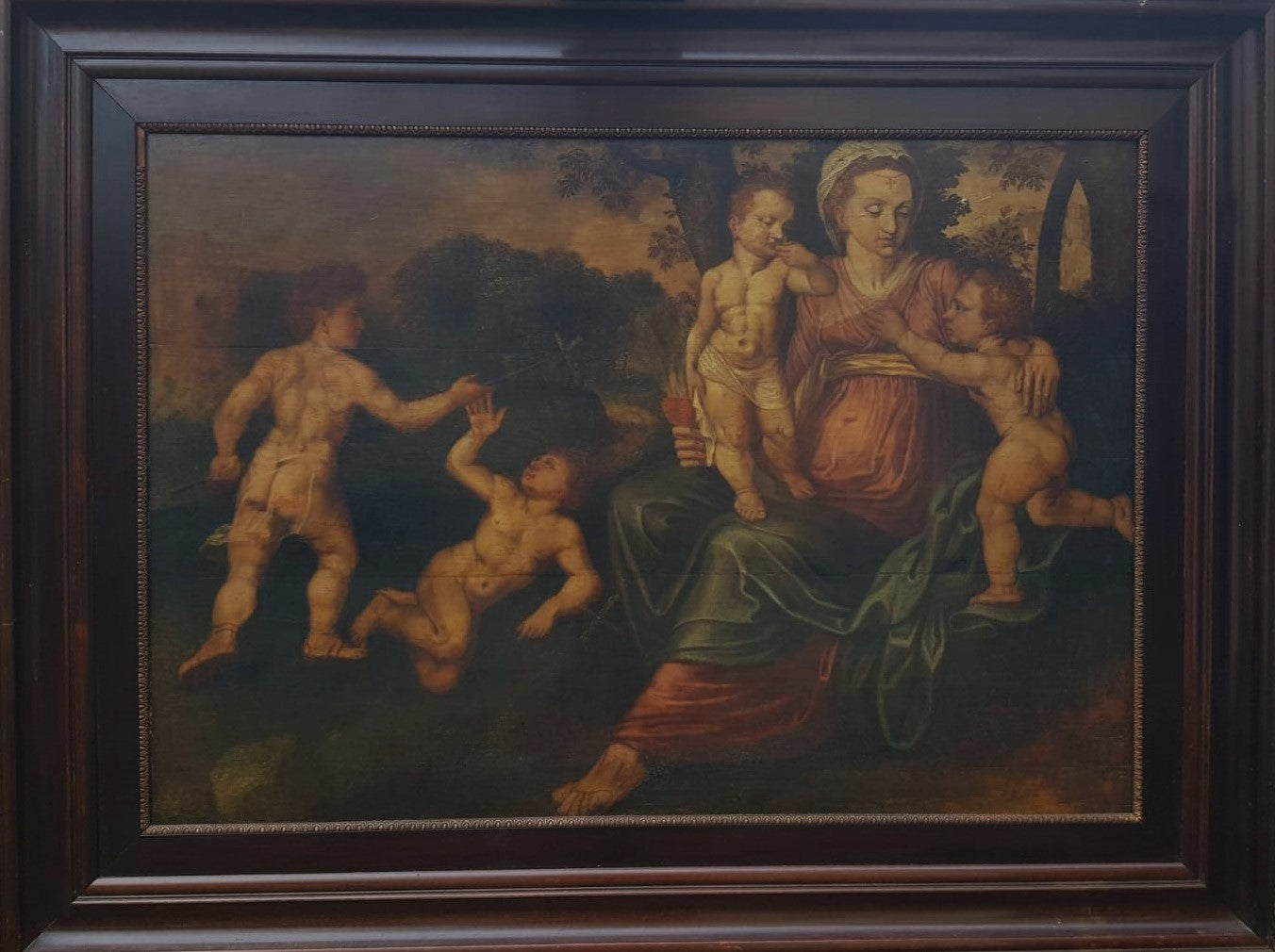 North European School, 16th Century, Oil on Panel, "Madonna and Child with Infant Figures in a Landscape"